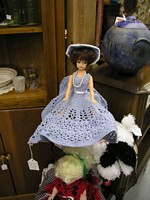 Barbie style doll in hand crocheted blue dress and hat