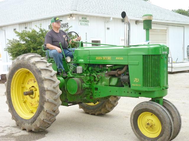 Vintage John Deere Diesel Tractor with Power Steering in Monday's parade at the fair